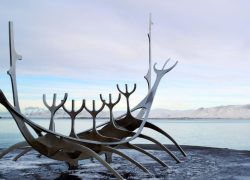 Sun Voyager, a sculpture by Jon Gunnar Arnason, sets next to the sea in Reykjavik. It represents a dreamboat as an ode to the sun. This photo is a link to Reykjavik Iceland location page.