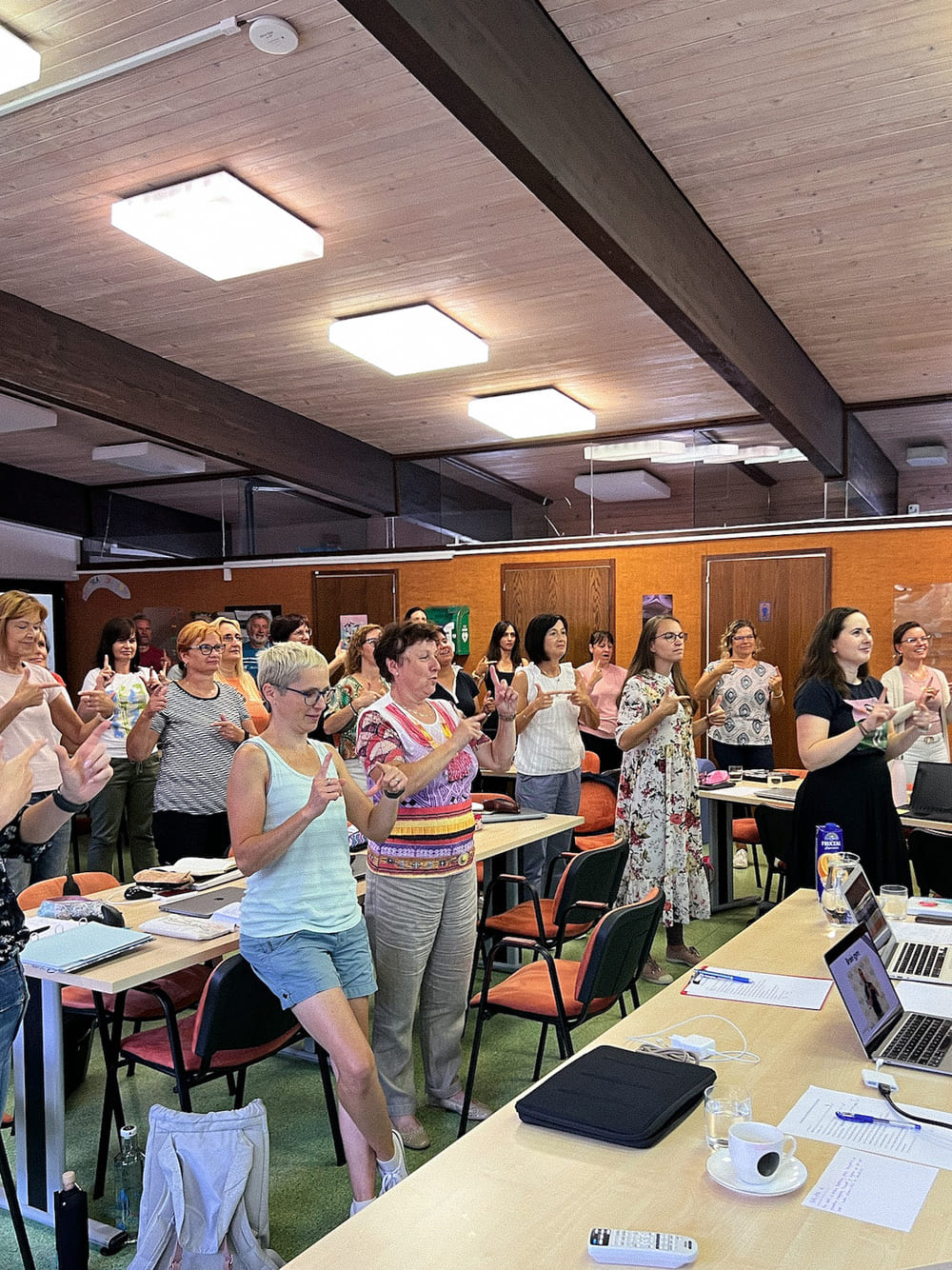 A group of teachers practicing Brain gym activity during a training conducted by erasmus+ invited expert