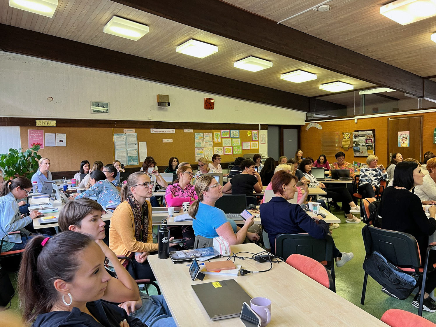 A room full of teachers sitting at desks listening to a lecture by Erasmus+ invited expert Ana Mladina Puljak