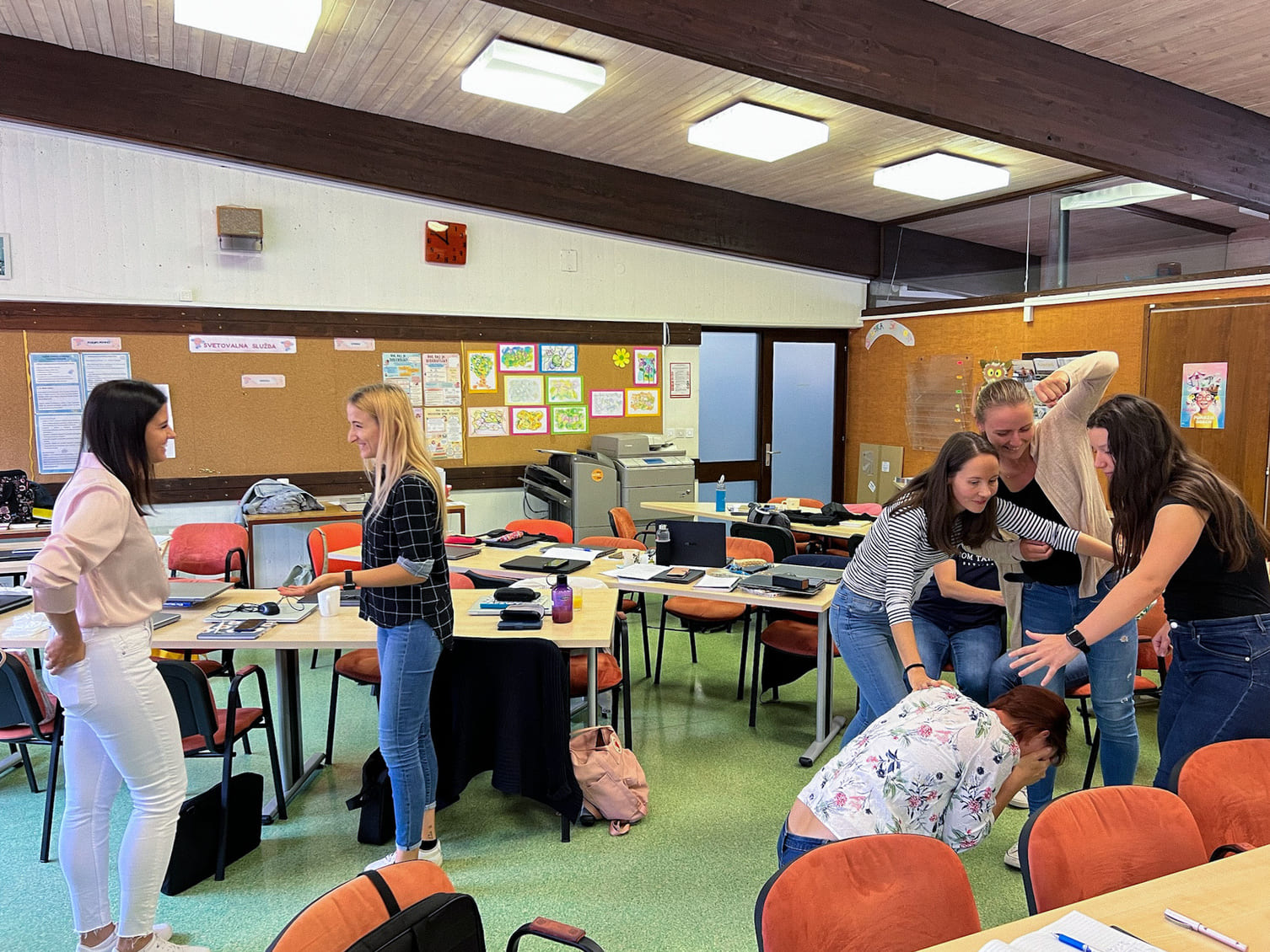 A group of teachers practising drama-based role play activities in the classroom