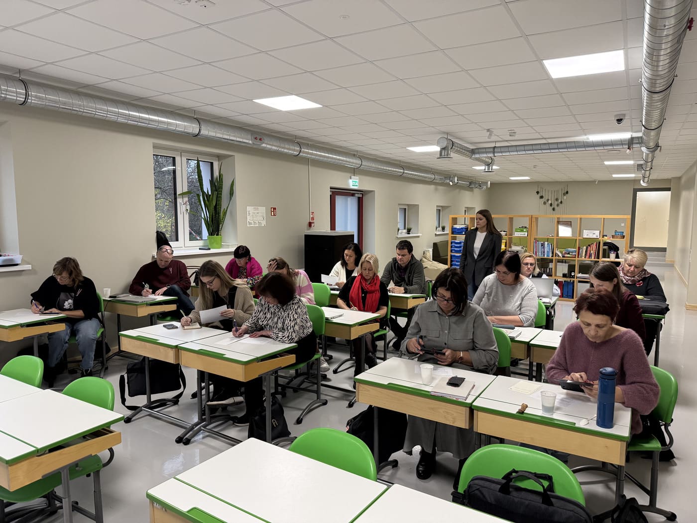 Teachers working at their laptops, learning about Artificial Intelligence tools in education during Ana Mladina Puljak’s Erasmus+ Invited Expert visit